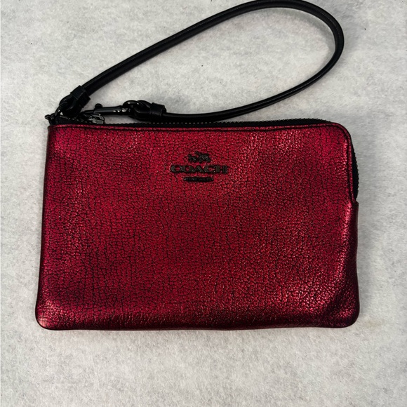 Coach Handbags - Coach Red Metallic wristlet NWOT
